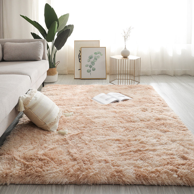 Plush Floor Mats Under The Bed In The Room Coffee Table
