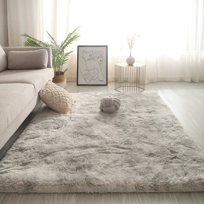 Plush Floor Mats Under The Bed In The Room Coffee Table